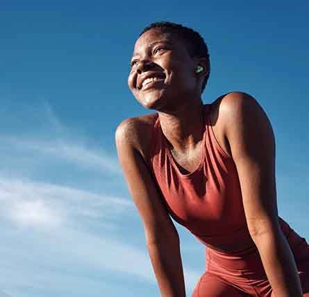 Lady smiles outdoors